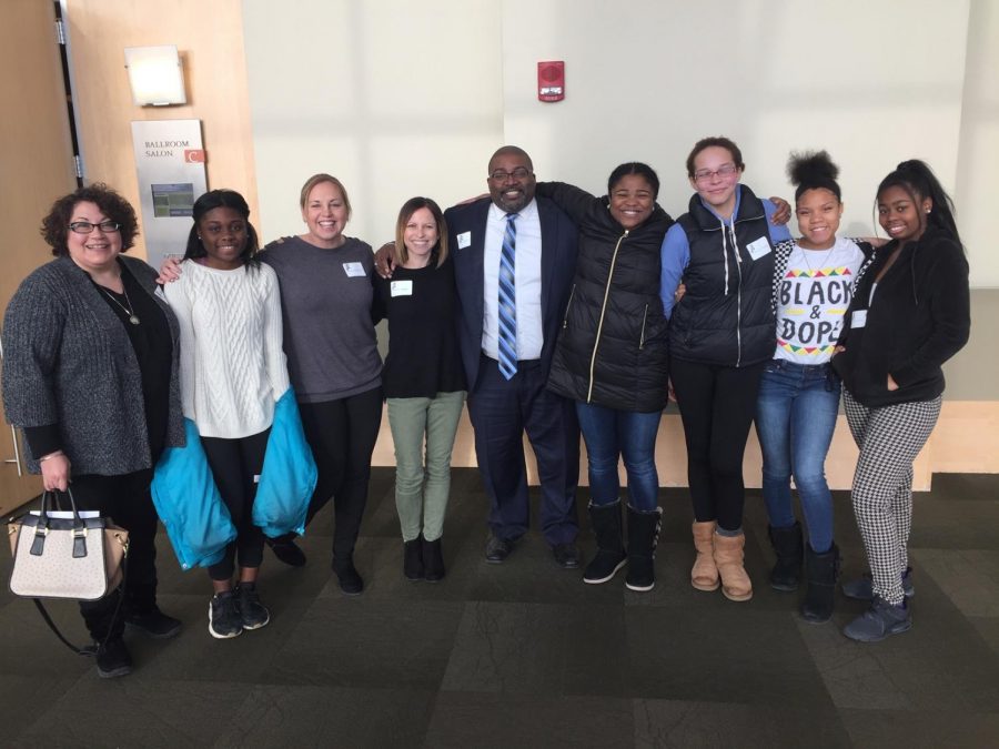 Ms. Maria Araeipour, Christeen Knox (9), Ms. Mandy Benson, Ms. Krissy Mueller, Dr. Dan Johnson, Nyla Noble (12), Caitie Lindley (12), Kalayah Martin (10), and Ajana Parker (10) attend the annual Martin Luther King, Jr. Day Breakfast at the Grand River Center on January 21, 2019. Vincent Bacote, an author and theology professor at Wheaton College, was the keystone speaker at the event. 